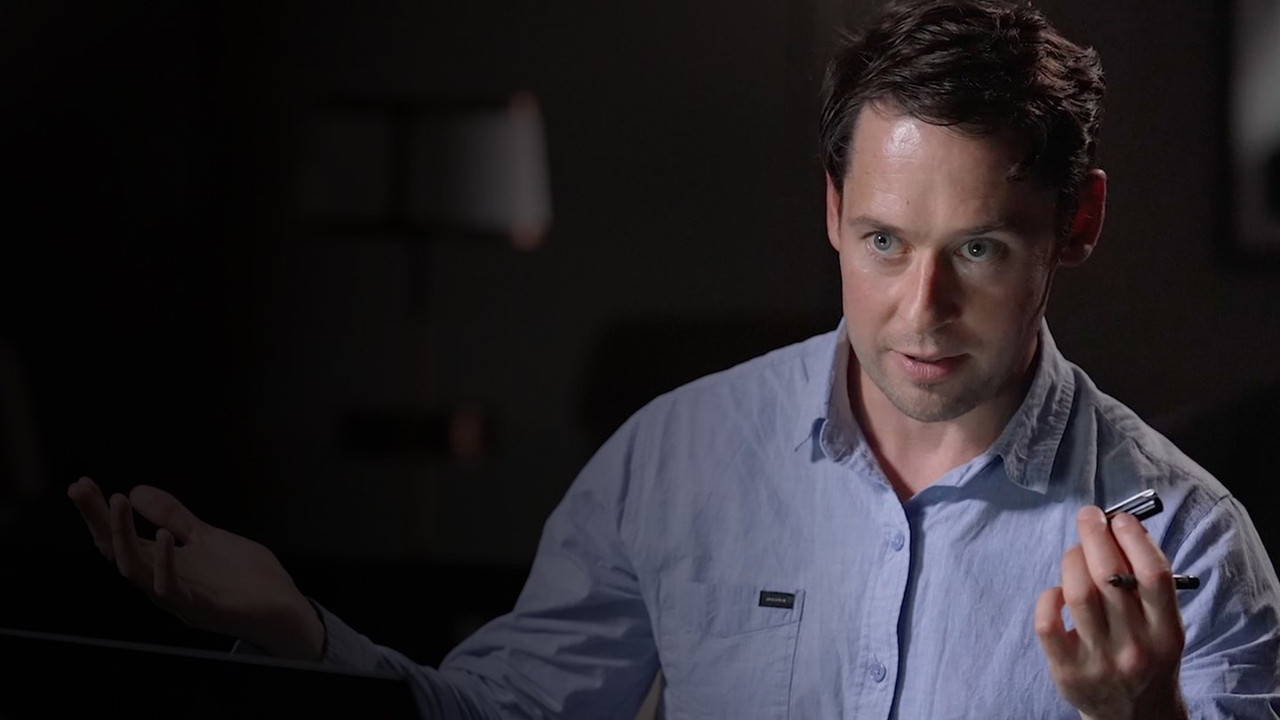 Kush Është Ai backdrop