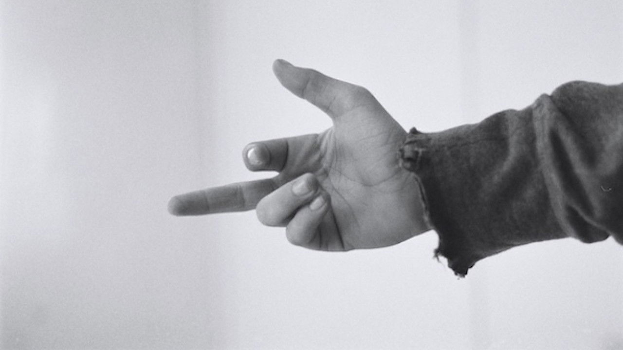 Të Jetosh Rrezikshëm backdrop