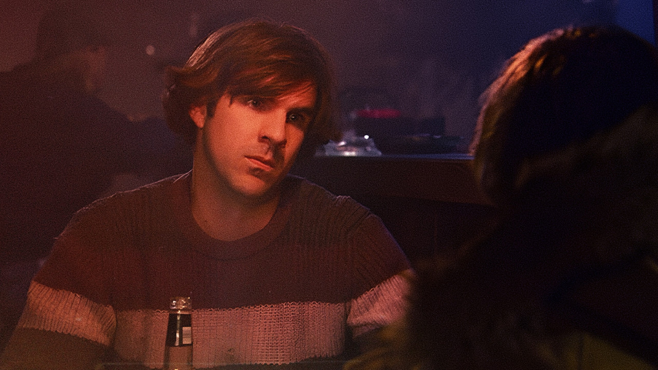 Njeriu i Zhveshur backdrop