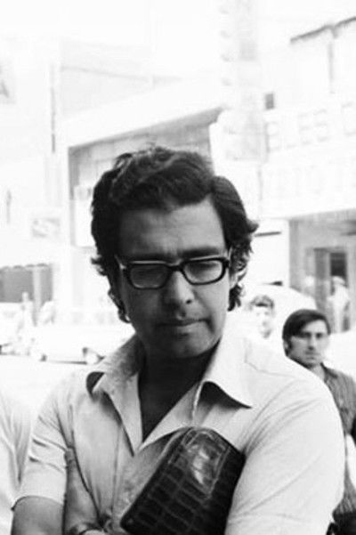 Carlos Flores Delpino backdrop