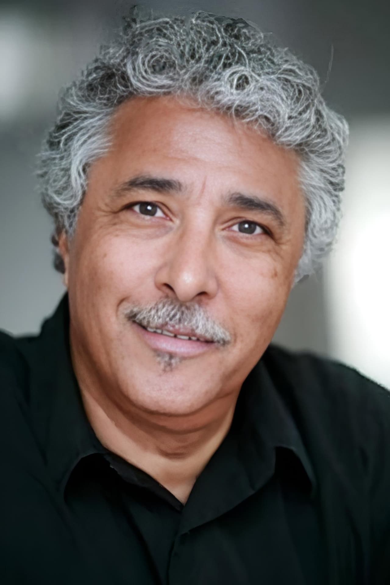 Mostéfa Stiti backdrop