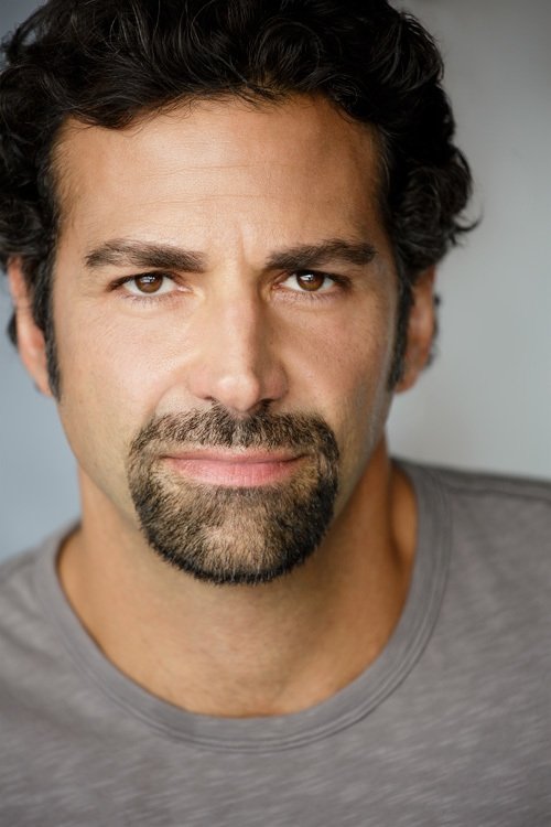 Elijah Alexander backdrop