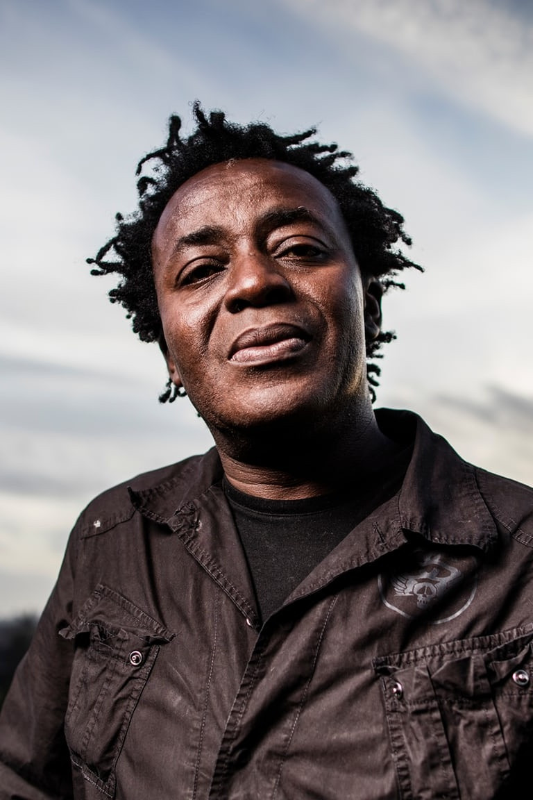 John Akomfrah backdrop