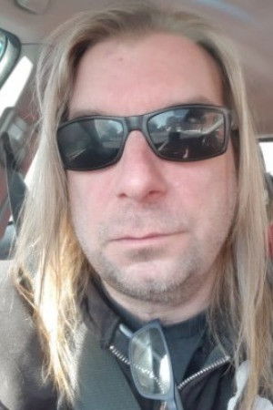 Brett Kelly backdrop