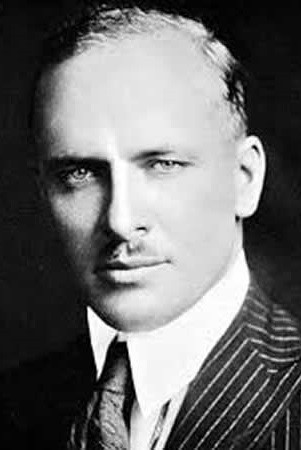 John G. Blystone backdrop