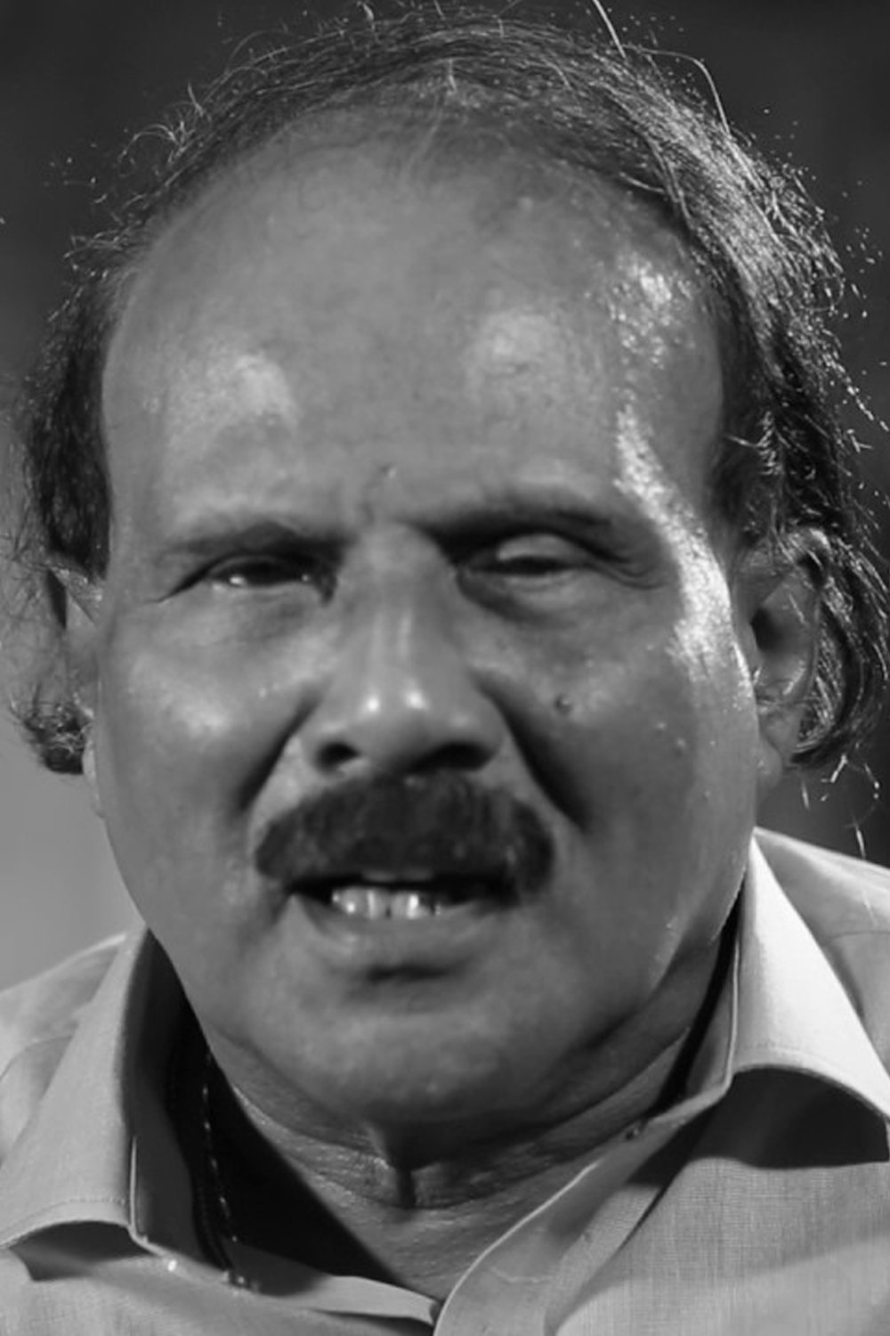 Kaloor Dennis backdrop