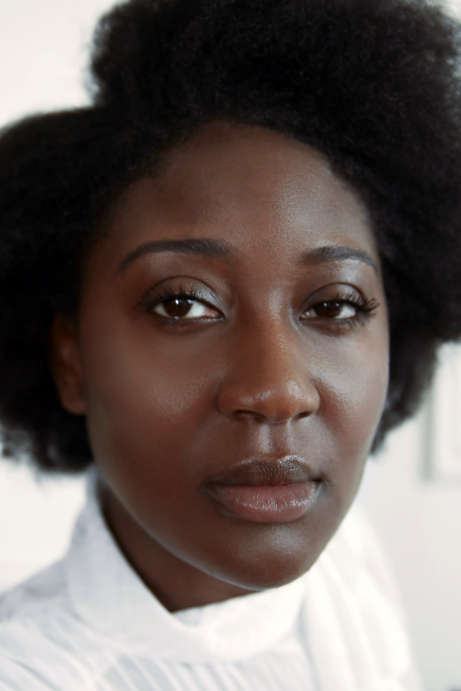 Ellie Foumbi backdrop