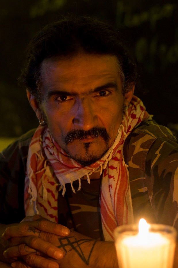 José Miguel Romero backdrop