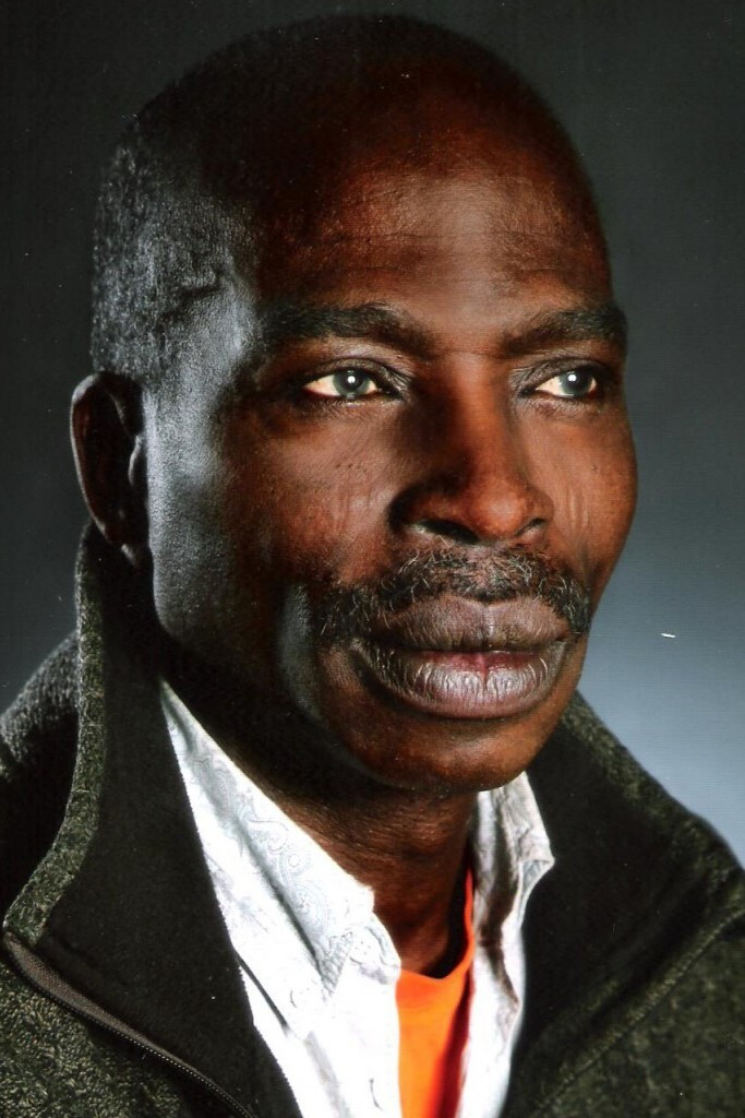 Michael Ojake backdrop