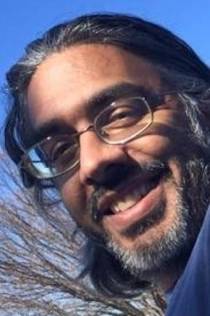 Anand Upadhyaya backdrop