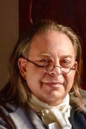 Mitçel Kremër backdrop