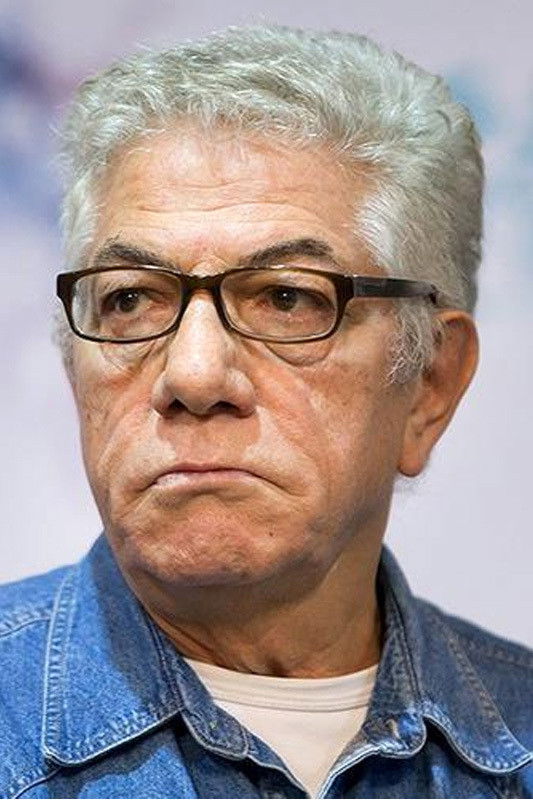 Ali Reza Zarrindast backdrop