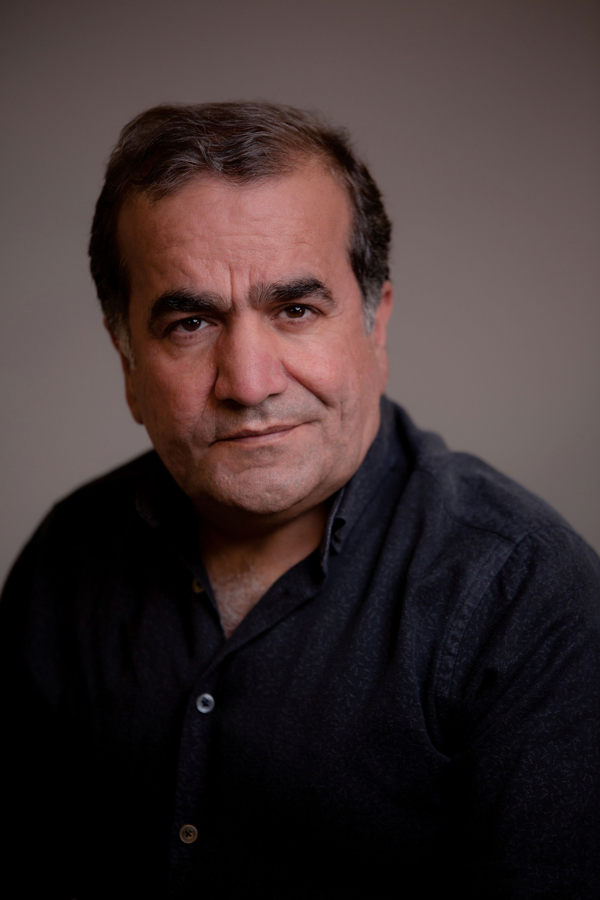 Shawkat Amin Korki backdrop