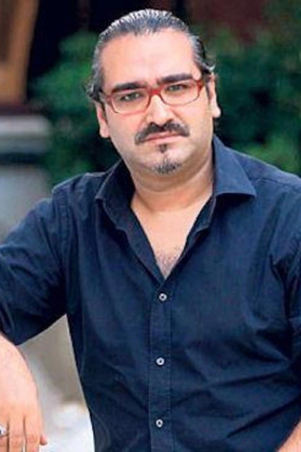 Hasan Karacadağ backdrop