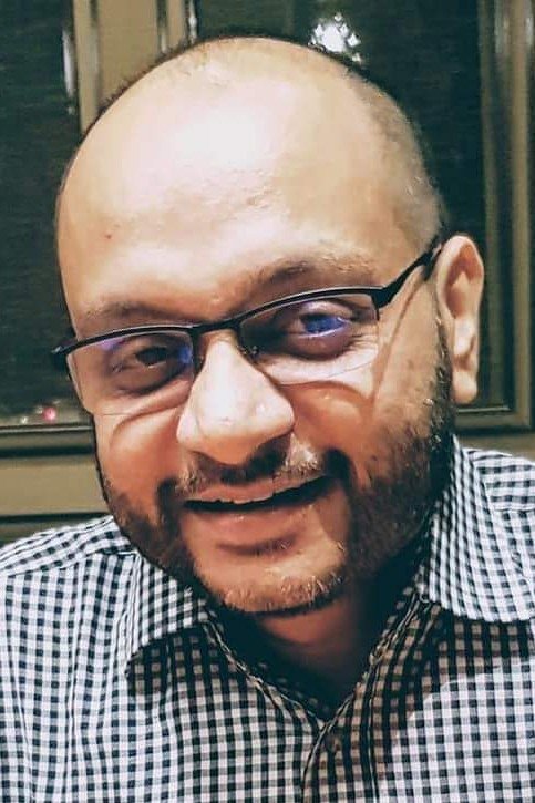 Joy B. Ganguly backdrop