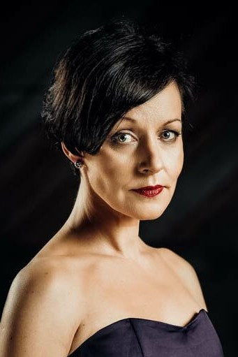 Vita Vārpiņa backdrop