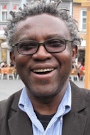 Jean-Marie Téno backdrop