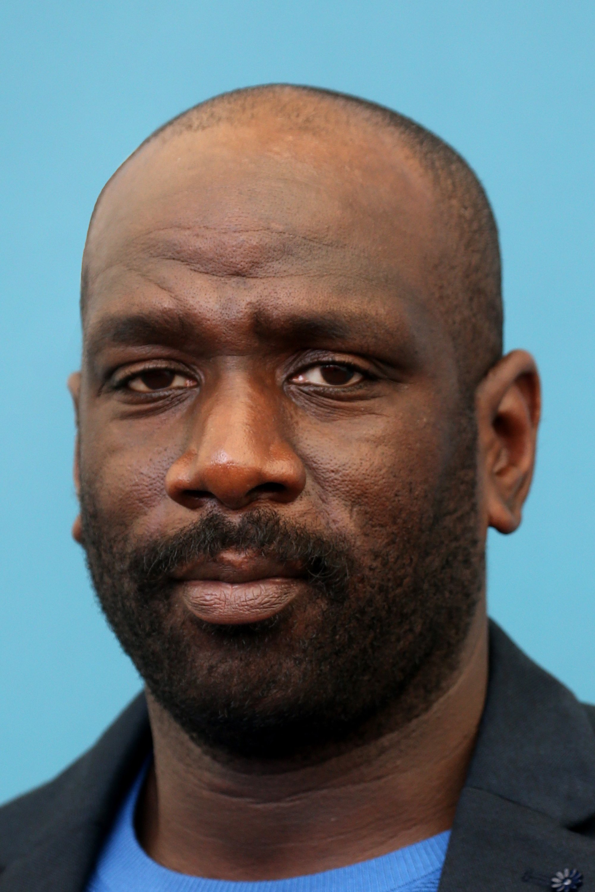 Steve Tientcheu backdrop