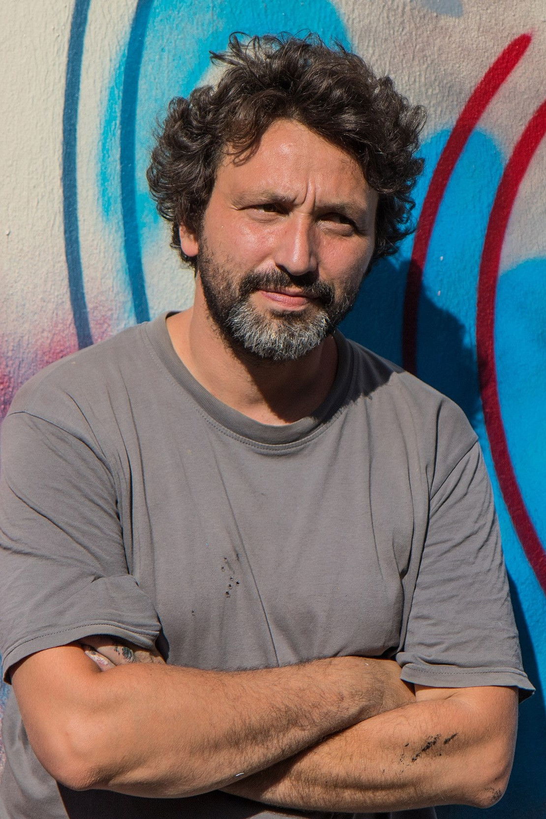 Christian Guémy backdrop