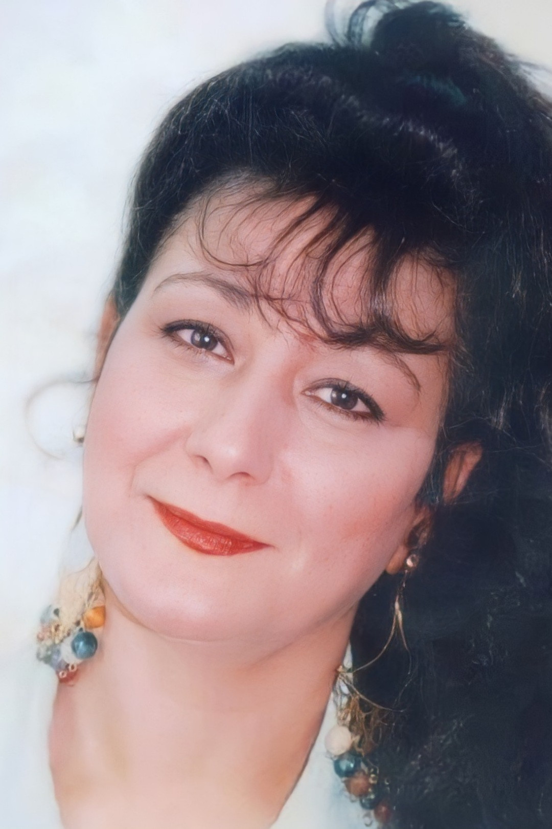 Ahlam Al Gritly backdrop