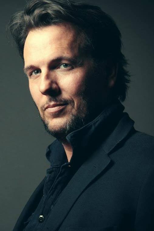 Xhej Huguli backdrop