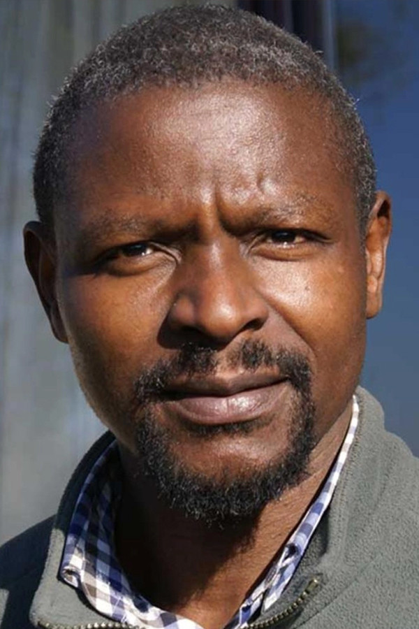 Théophile Sowié backdrop