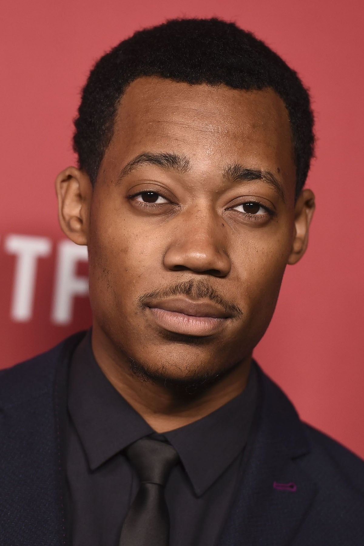 Tyler James Williams backdrop