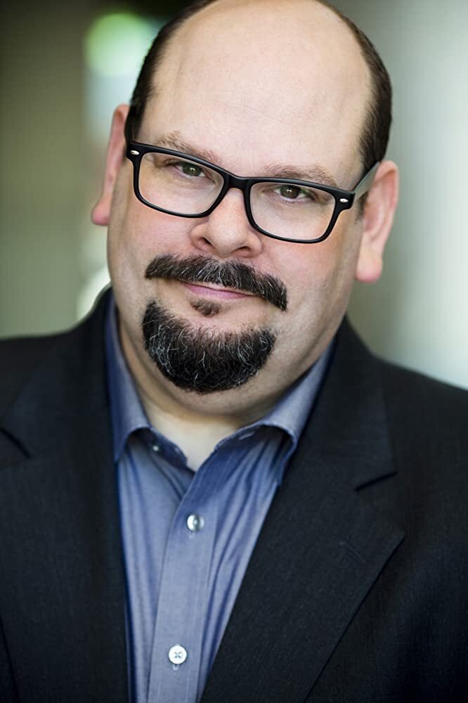 Džoel Mëkrari backdrop