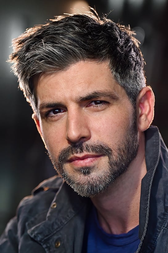 Kayvon Esmaili backdrop