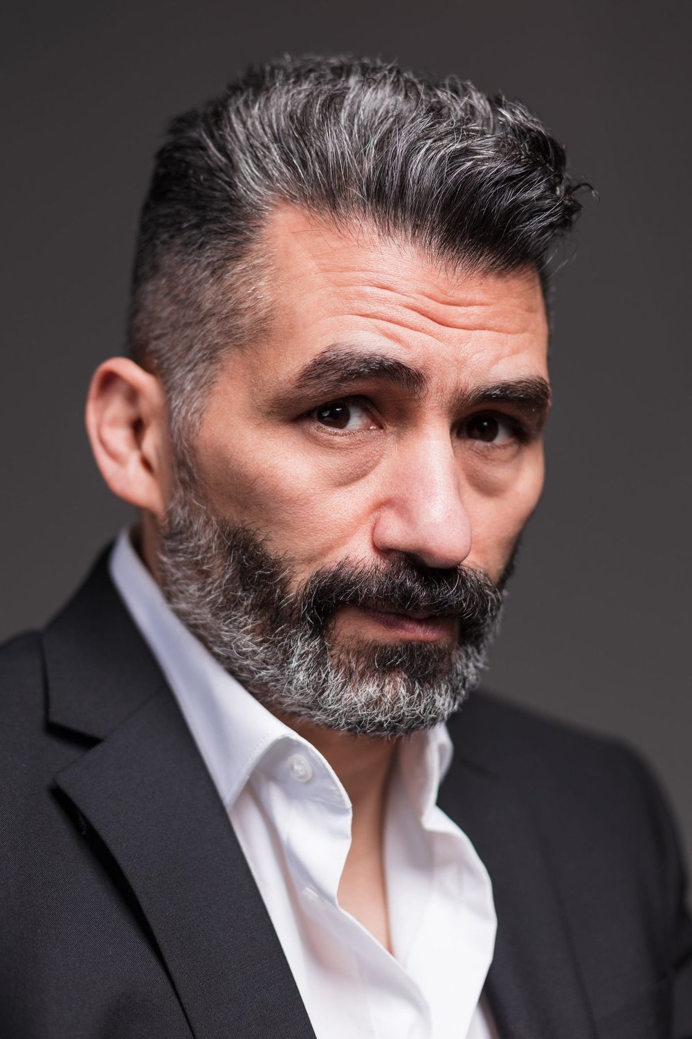 Tamer Yiğit backdrop