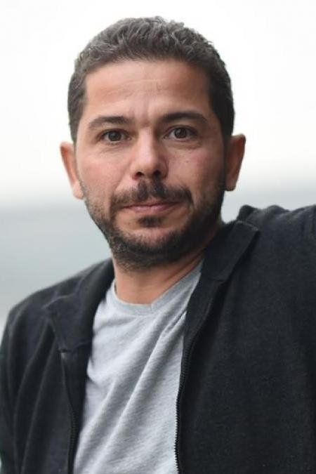 Atılay Uluışık backdrop