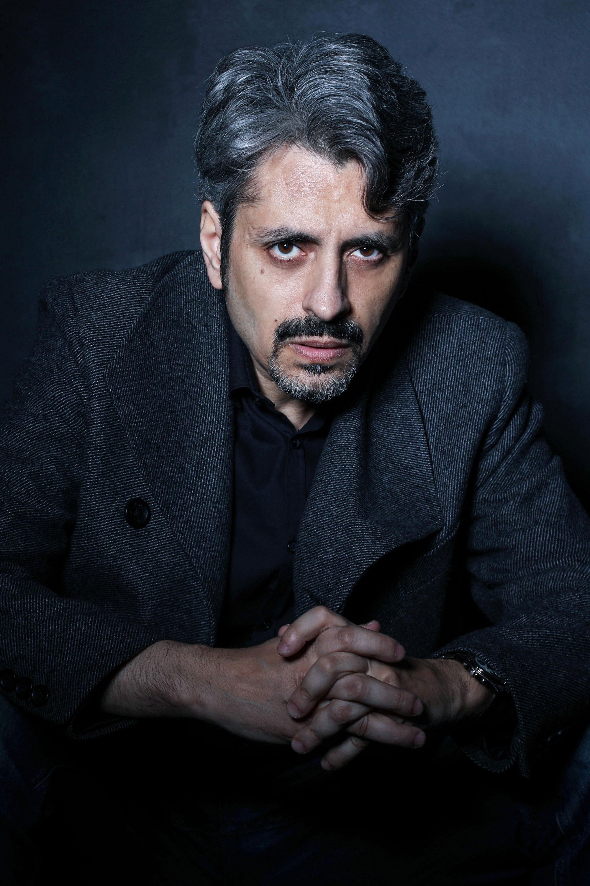 Massimo Coglitore backdrop