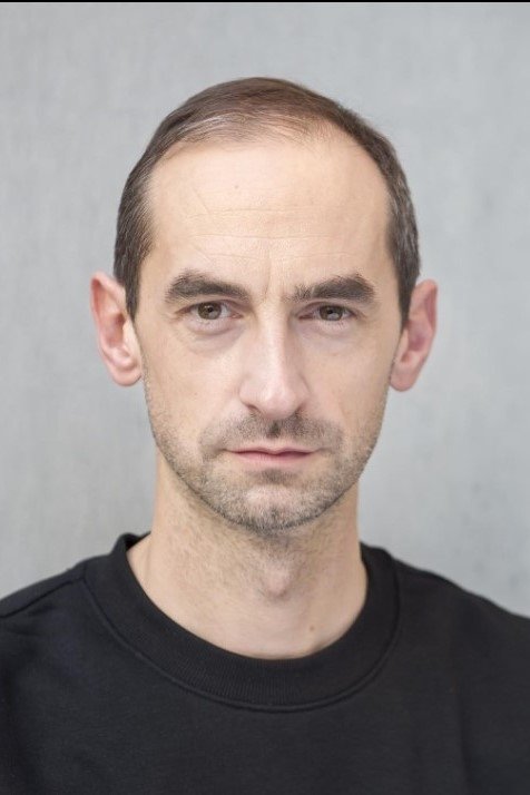 Xheimi Bredli backdrop