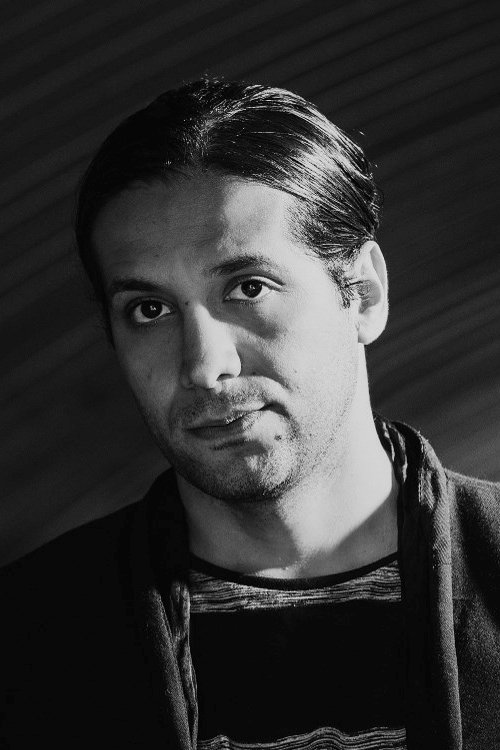 Amir Escandari backdrop