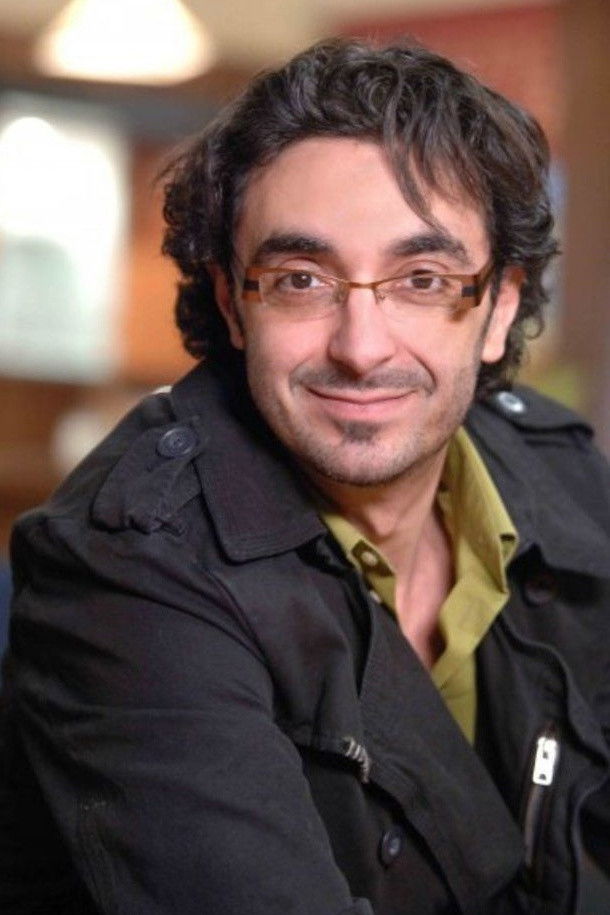 Assad Fouladkar backdrop