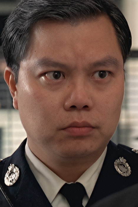 Shin  Kam-Ching backdrop