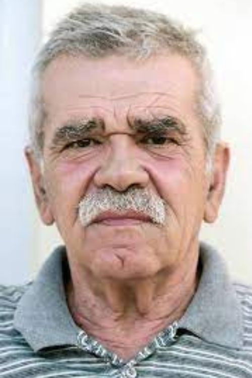 Robert Ndrenika backdrop