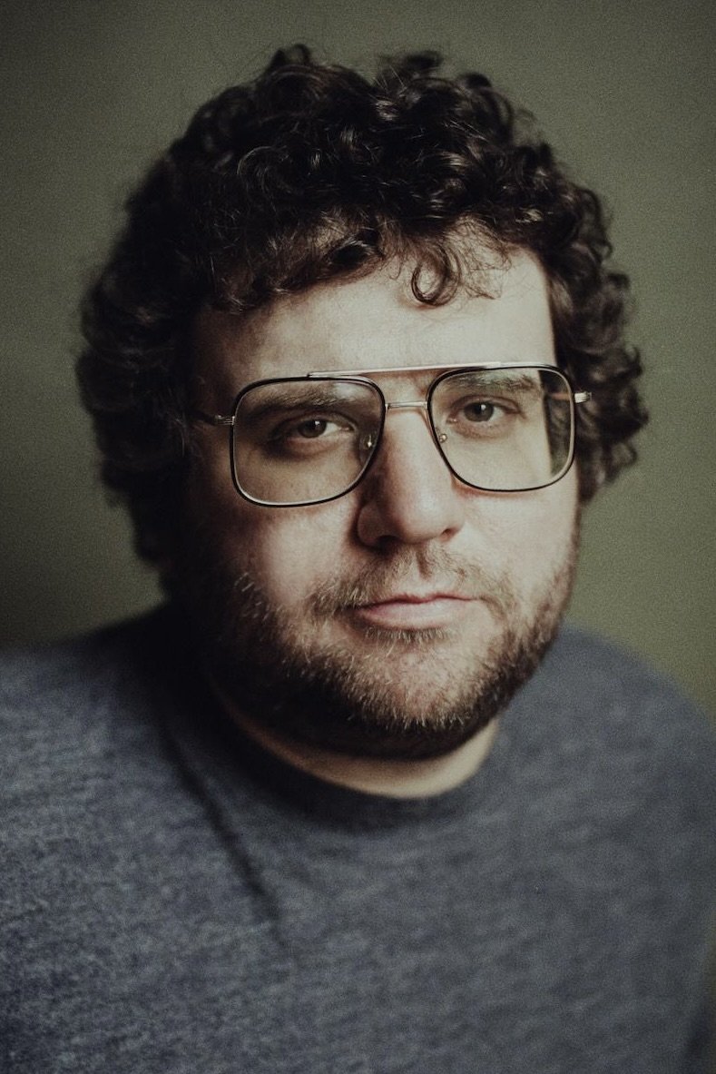 Eric K. Boulianne backdrop