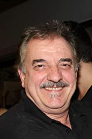 Michalis Mitrousis backdrop