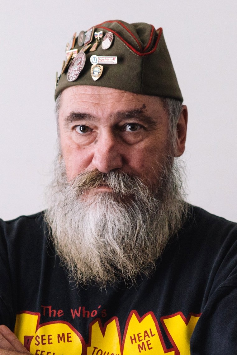 Tzimis Panousis backdrop