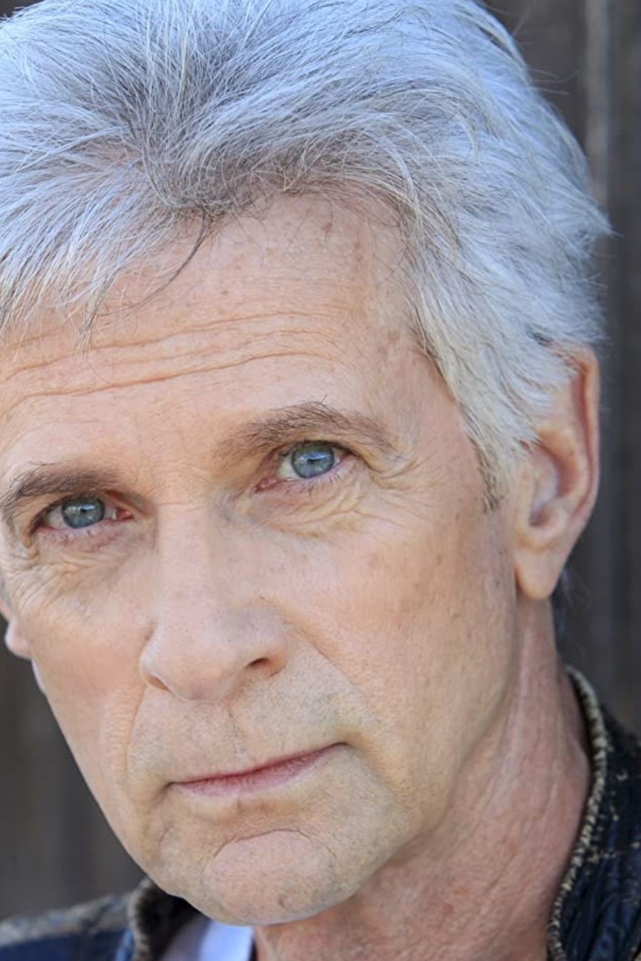 Mark Schneider backdrop