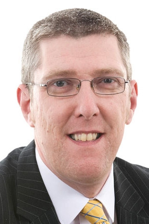 John O'Dowd backdrop