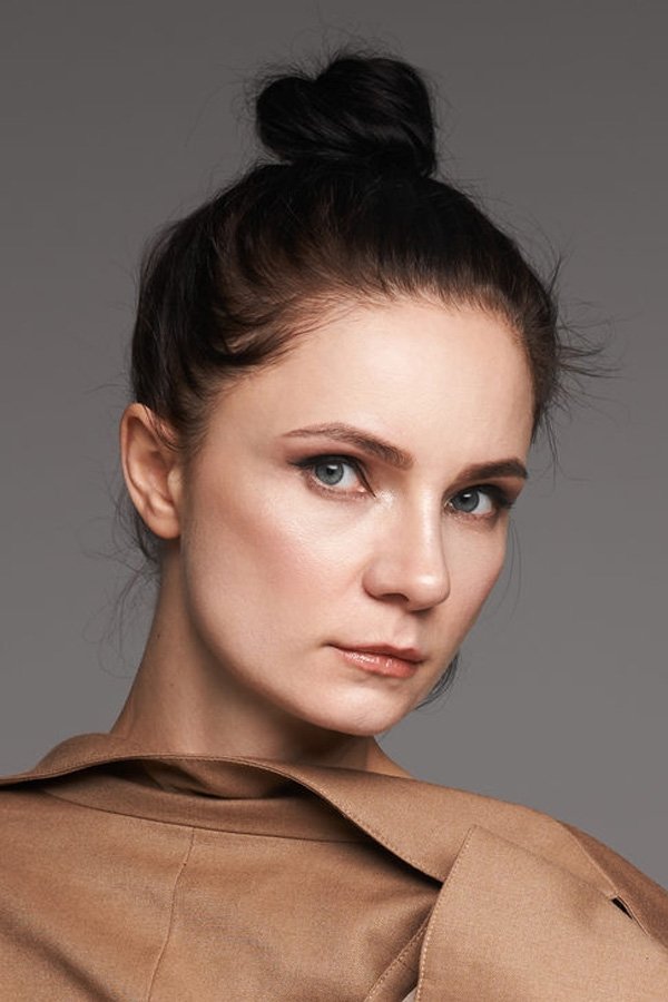 Olga Ozollapinya backdrop