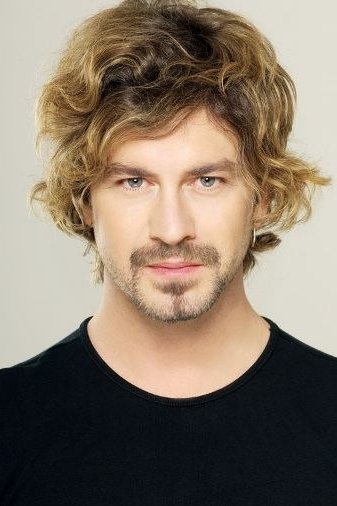 Tan Sağtürk backdrop