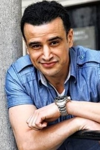 Khalid Boudou backdrop