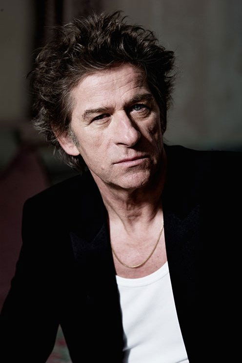 Hubert Félix Thiéfaine backdrop