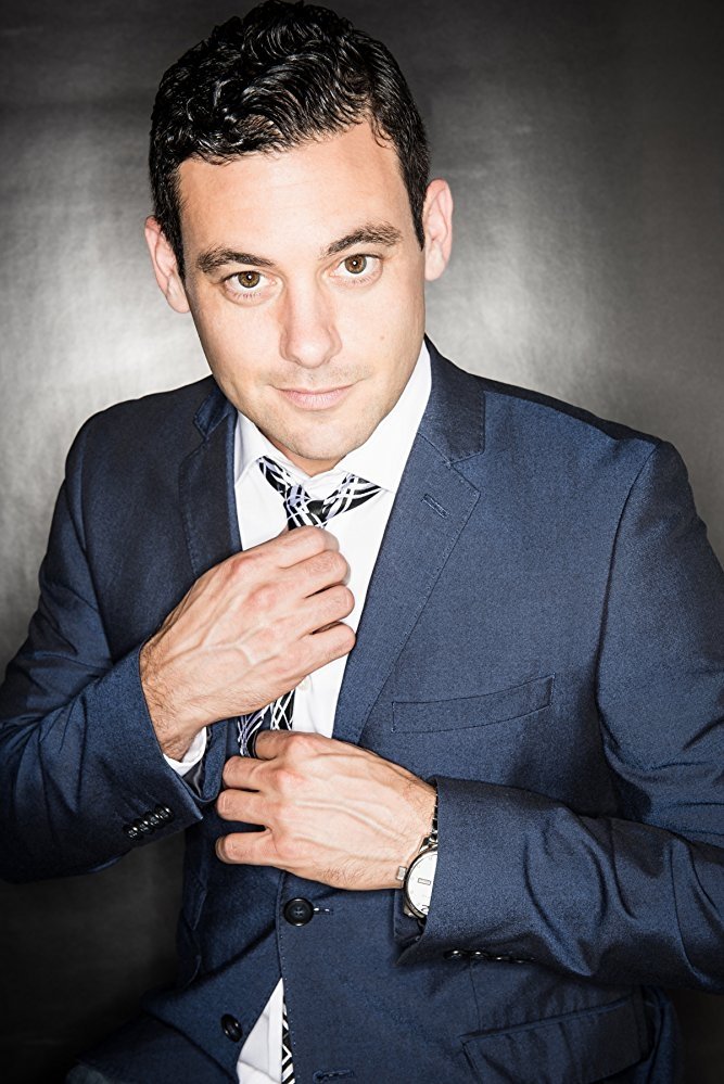 Jesse G. Louis backdrop