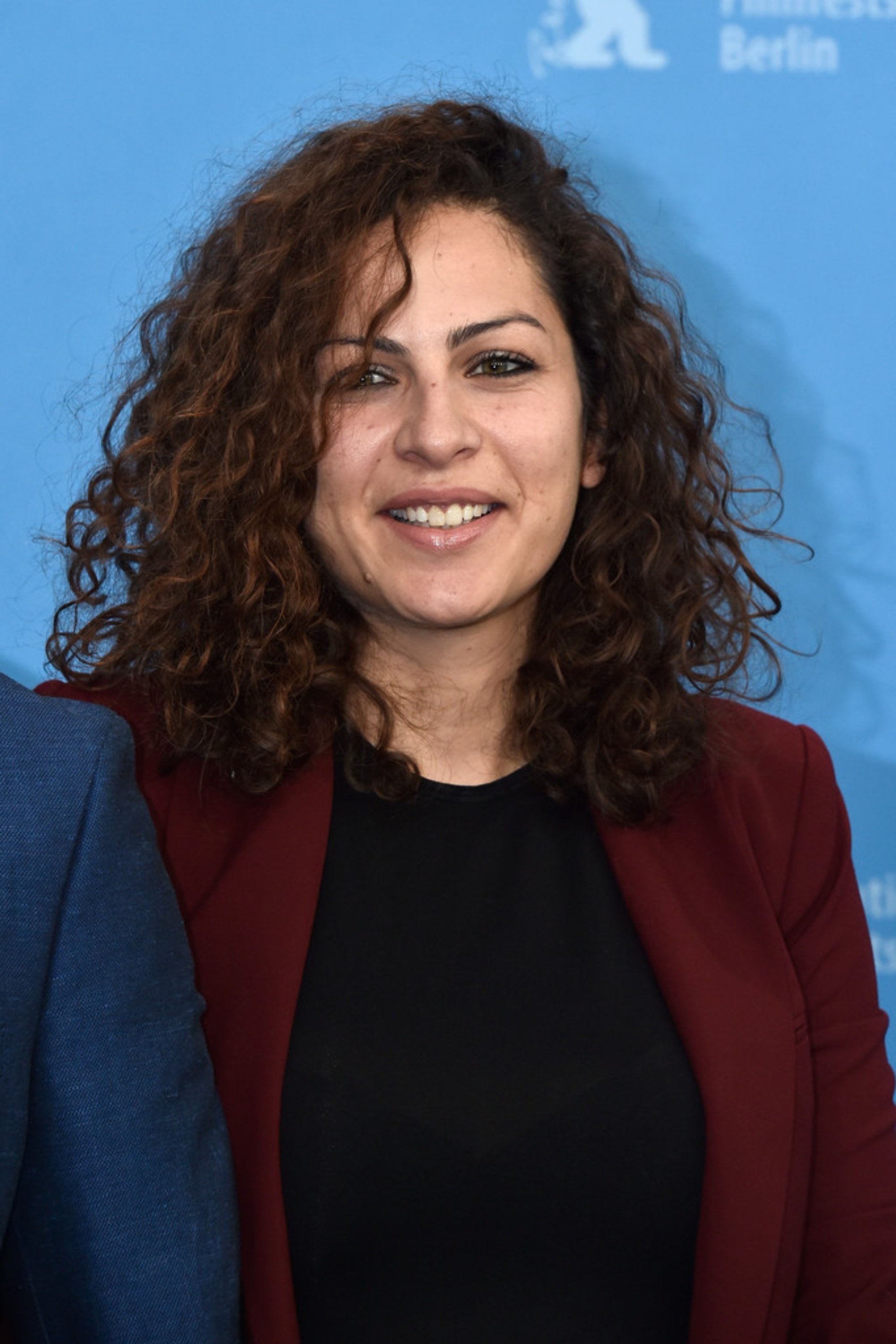 Rym Ben Messaoud backdrop