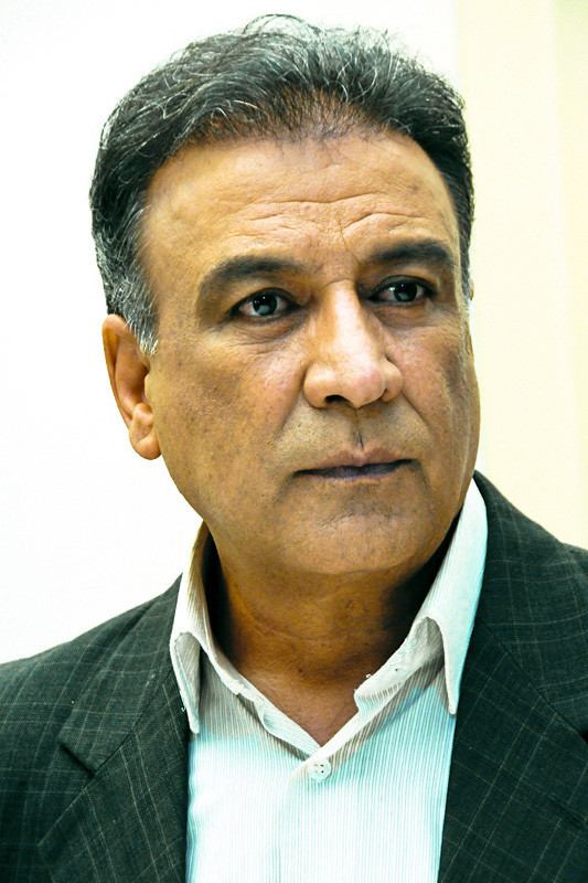 Abdolreza Akbari backdrop