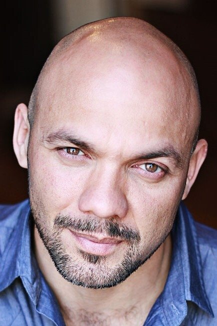 Hugo E. Carbajal backdrop